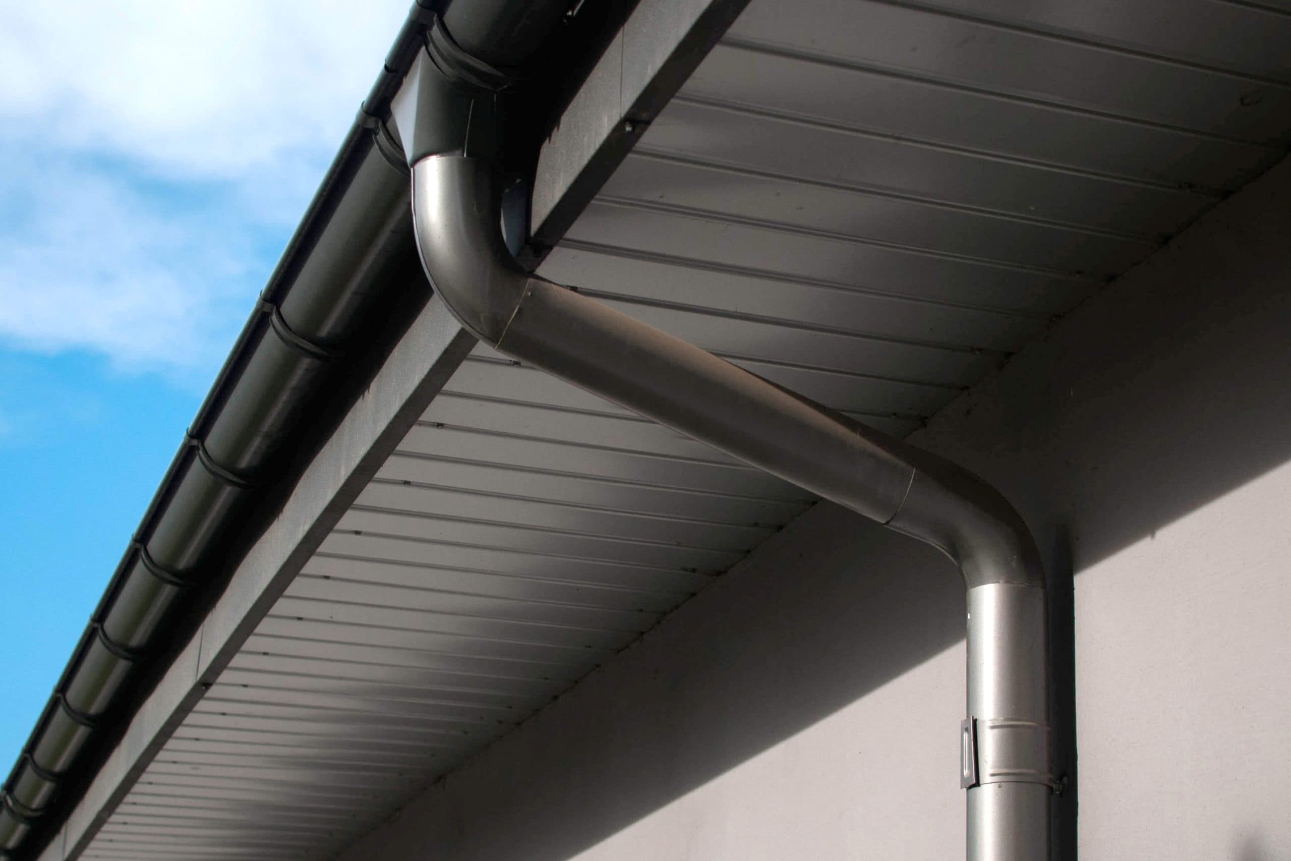 Corrosion-resistant galvanized gutters installed on a commercial building in Durham